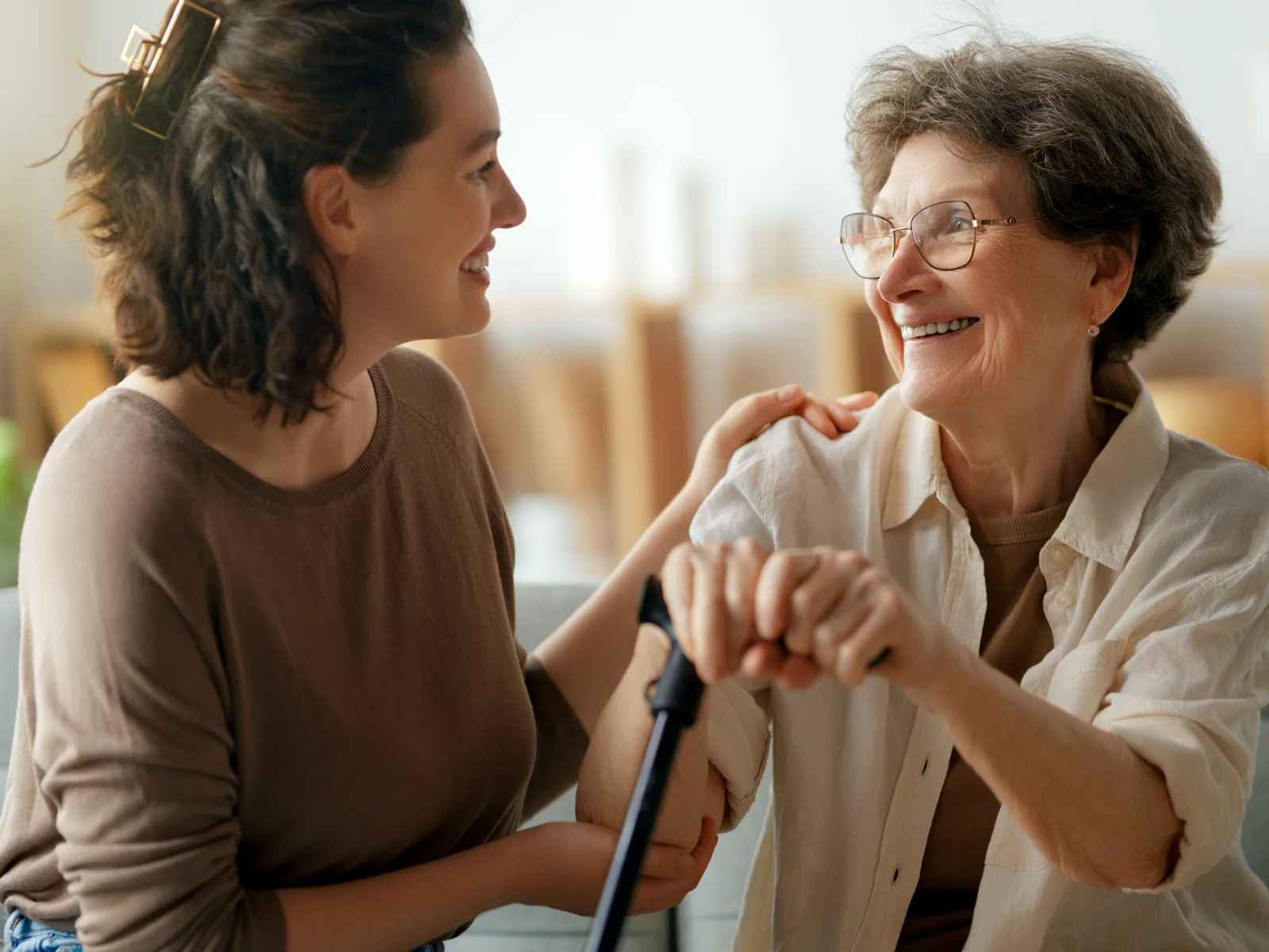 A companion spending time with an older adult at home